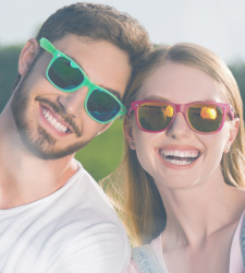 happy couple in sunglasses