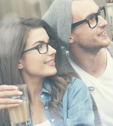 happy couple with glass of coffee