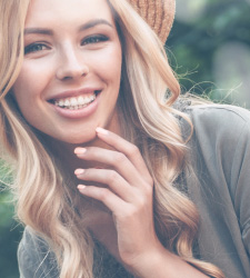 smiling woman in hat